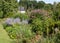 Landscape view of the stunning garden at Jardin du Plessis Sasnieres in the Loire Valley, France.