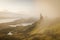 Landscape view at sunset with colourful clouds of Old Man of Storr rock formation, Scotland, United Kingdom