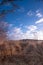 Landscape view at sunset, large nature reserve with a lake, white clouds and blue sky. Fochteloerveen, The Netherlands