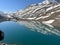 Landscape view of Suraj Tal Lake in Himachal Pradesh, India with snowy mountains