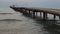 Landscape view of Tranquil Sunrise on the sea with wooden pier.