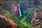 Landscape view of Waipoo waterfall in Waimea canyon, Kauai