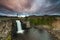 Landscape with a view of the waterfall and beautiful sky.