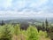 The landscape of the village with a vineyard, forest, hills.