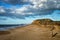 Landscape vivd sunset over beach and cliffs