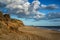 Landscape vivd sunset over beach and cliffs