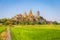 Landscape of Wat Tham Sua Temple Tiger Cave Temple with Jasmine rice fields at Kanchanaburi Province, Thailand.