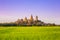 Landscape of Wat Tham Sua Temple Tiger Cave Temple in Sunset scence with Jasmine rice fields at Kanchanaburi Province