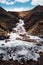 Landscape water fall with frozen water in winter with blue sky