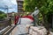 Landscape of the Water Park Taikobashi, with bridge and woman statue in Arima Onsen Hot Spring Town, Japan