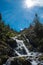 Landscape with waterfall in the mountains in summer at Parc Natural del Comapedrosa, Andorra