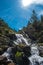 Landscape with waterfall in the mountains in summer at Parc Natural del Comapedrosa, Andorra