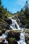 Landscape with waterfall in the mountains in summer at Parc Natural del Comapedrosa, Andorra