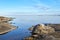 Landscape. Wildlife. Lake Ladoga. Summer. Bay with a narrow channel divided the island into two parts. On the right we see a large