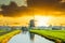 Landscape with windmill Mill 1 of molenviergang in Aarlanderveen during sunrise