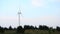 Landscape with windmill wind power technology - low angle view on Energy Production.