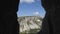 Landscape through the windows cut into the rock. Chufut-Kale is a cave city.