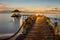 Landscape of Wooded bridge pier between sunset