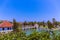 Landscaped gardens and footbridge over pond at Ujung Water Palace Ujung Park or Sukasada Park in Bali, Indonesia, Asia