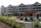 Landscaped grounds and exterior of luxury hotel, The Chautauqua Harbor Hotel, Celoron, NY, summer, 2021