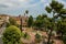 Landscaped square with buildings and street in the city center of Grasse.