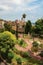 Landscaped square with buildings and street in the city center of Grasse.