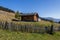 Landscapes on Alpe di Siusi with small cabins on grassland in autumn, South Tyrol, Italy