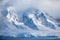 Landscapes Antarctica beautiful snow-capped mountains against the cloud sky