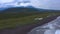 Landscapes of Kamchatka. Khalaktyrsky beach with black volcanic sand.