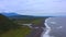 Landscapes of Kamchatka. Pacific coast. Khalaktyrsky beach with black volcanic sand.