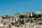 Landscapes of Naples; view from the shore of the houses of local residents behind which is therport