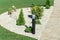 Landscaping in a private yard. Natural stone sidewalk and green lawn