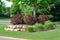 Landscaping with Weigela Shrubs and Rock Retaining Wall