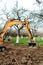 Landscaping works at home construction site using excavator and mini bulldozer