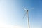 Landskape with Wind turbine against the blue sky