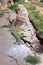 Landslides cracks in the asphalt road.