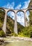 Landwasser Viaduct in Swiss Alps, vertical view of railroad bridge in Switzerland
