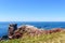 Lange Anna sea stack rock on Helgoland island against blue sea on clear day