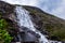 Langfossen Langfoss waterfall in summer, Etne, Norway