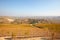 Langhe hills view, vineyards in autumn with yellow leaves