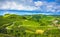 Langhe vineyards view, road and Sinio small village, Piedmont, Italy Europe