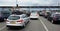 Languedoc-Roussillon, France - July 28 2018: Wide panoramic shot of cars queuing at the toll gate or Peage, waiting to pay for tra
