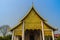 Lanna\'s style golden patterned background on the Buddhist church gable end. Thai golden pattern background crafted on the gable i