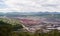 Lanscape of coalmine with cloudy and mountain