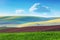 Lanscape of Colorful fields in beautiful striped hills in minim