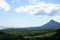 Lanscape panoramic view over mountains, fields and sea