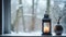 Lantern with burning candle and a vase with white flowers on a windowsill, with snowy winter landscape outdoors. Generative AI