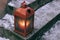 Lantern with candle at outdoor stair