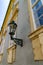 Lantern on the colorful front of a house in Prague