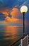 Lantern in the evening on the pier in Heringsdorf with sunset in the background. Baltic Sea island Usedom. Germany